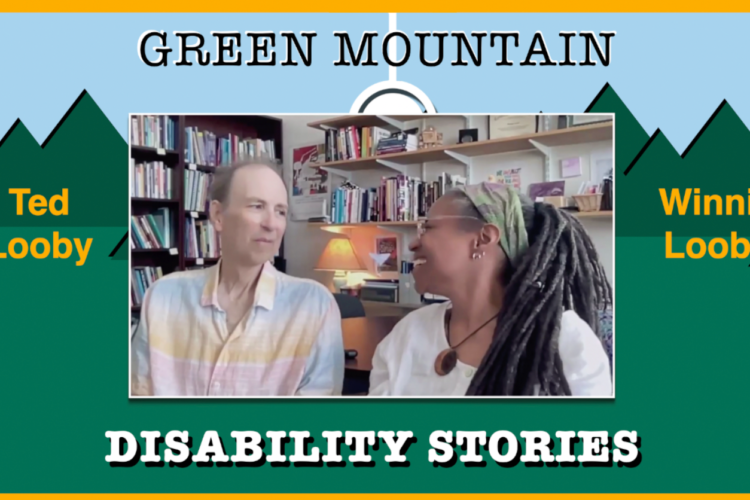 Video still of two people, a white man and a Black woman, both middle-aged, looking at each other tenderly mid-conversation