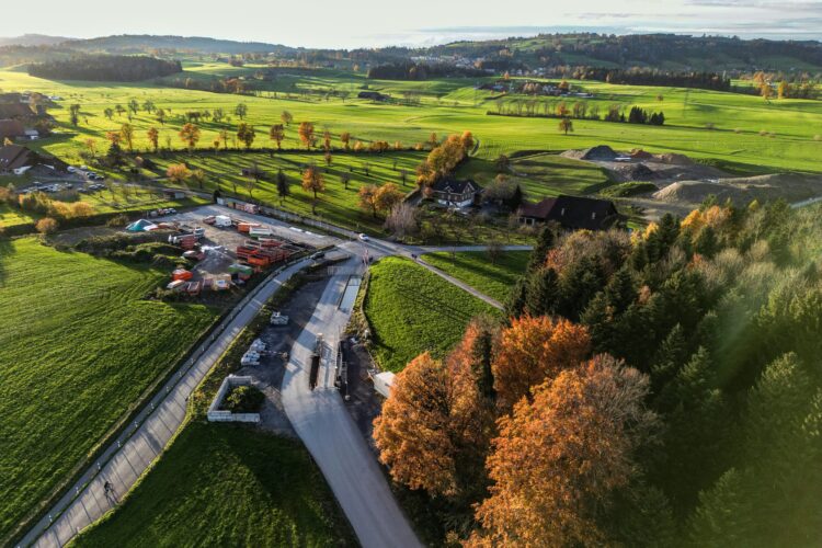 an aerial view of a rural area with a road running through it