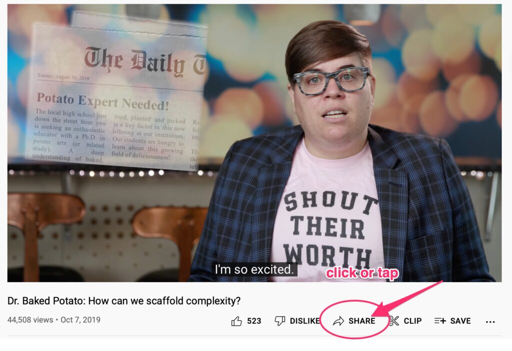 a screenshot of YouTube showing the SHARE link under a video. It's circled and has an arrow pointing to it.